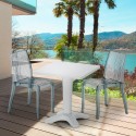 Vierkante salontafel wit 70x70 cm met stalen onderstel en 2 transparante stoelen Dune Terrace Aanbod