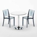 Ronde salontafel wit 70x70 cm met stalen onderstel en 2 transparante stoelen B-Side Spectre Kortingen