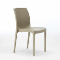 Vierkante salontafel wit 90x90 cm met stalen onderstel en 4 gekleurde stoelen Boheme Love Kosten