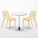Ronde salontafel wit 70x70 cm met stalen onderstel en 2 gekleurde stoelen Gelateria Long Island Afmetingen