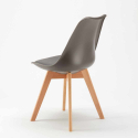 Ronde salontafel zwart 70x70 cm en 2 gekleurde stoelen Nordica Cosmopolitan 