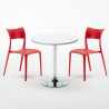 Ronde salontafel wit 70x70 cm met stalen onderstel en 2 gekleurde stoelen Parisienne Long Island Prijs