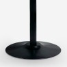 Table ronde Tulipan 120cm et 4 chaises en polycarbonate noir Haki+ 