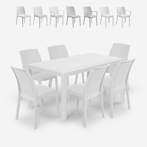 Stel voor buiten in de tuin rotan tafel van 150x90cm met 6 witte stoelen Meloria Light. Aanbieding