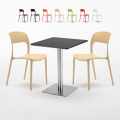 Vierkante tafel 60x60 cm Stalen onderstel en zwart top met 2 gekleurde stoelen Restaurant Pistachio Verkoop