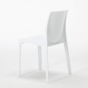 Vierkante salontafel wit 70x70 cm met stalen onderstel en 2 gekleurde stoelen Ice Cocktail 