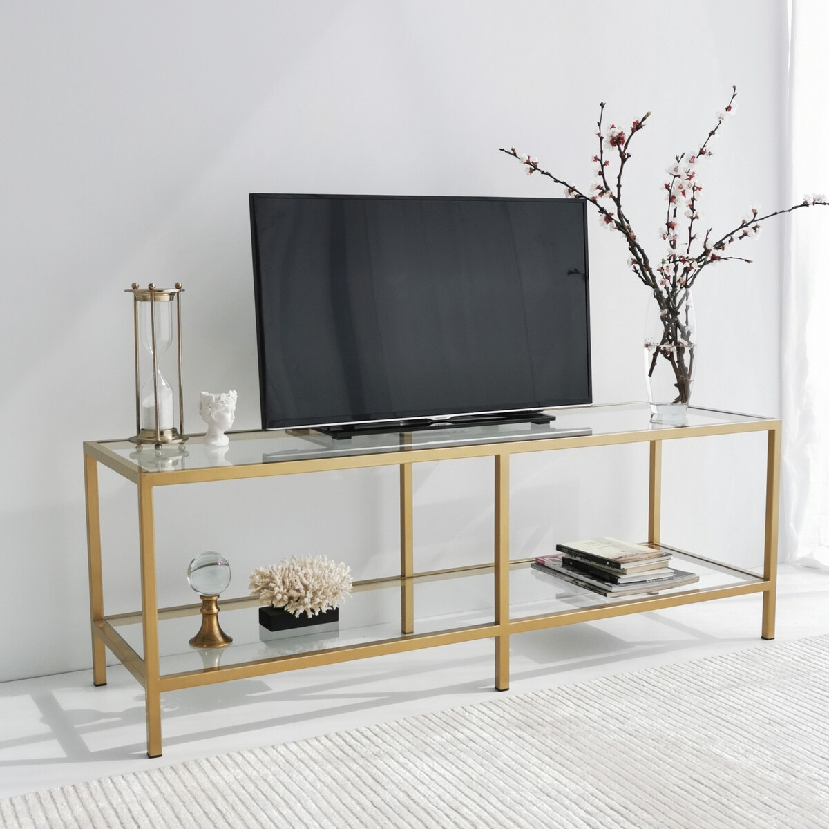 Moderne mobiele tv-meubel van metaal en glas 130cm Goldy Aanbieding Moderne mobiele tv-meubel van metaal en glas 130cm Goldy Aanbieding