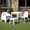 Tuinstoel van polypropyleen met rattan-look en armleuningen Paros Verkoop