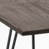 vierkante tafel en stoelen van metaal en hout in industriële Lix-stijl pigalle 